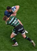 4 May 2024; Robbie Henshaw of Leinster is tackled by Fin Smith of Northampton Saints during the Investec Champions Cup semi-final match between Leinster and Northampton Saints at Croke Park in Dublin. Photo by Stephen McCarthy/Sportsfile