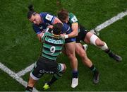 4 May 2024; James Lowe of Leinster is tackled by Northampton Saints players Alex Mitchell, 9, and James Ramm during the Investec Champions Cup semi-final match between Leinster and Northampton Saints at Croke Park in Dublin. Photo by Stephen McCarthy/Sportsfile