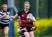 4 May 2024; Sadhbh Kelly of Tullamore is tackled by Sophie Malone of Skerries-Dundalk during the Leinster Rugby Bank of Ireland Girls Youth Finals Day match between Skerries-Dundalk and Tullamore at Energia Park in Dublin. Photo by Shauna Clinton/Sportsfile