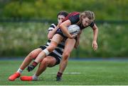 4 May 2024; Poppy Meyer of Tullamore is tackled by Alysah Hollywood of Skerries-Dundalk during the Leinster Rugby Bank of Ireland Girls Youth Finals Day match between Skerries-Dundalk and Tullamore at Energia Park in Dublin. Photo by Shauna Clinton/Sportsfile
