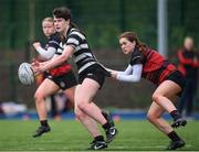 4 May 2024; Molly Whately of Skerries-Dundalk is tackled by Aoife Hughes of Tullamore during the Leinster Rugby Bank of Ireland Girls Youth Finals Day match between Skerries-Dundalk and Tullamore at Energia Park in Dublin. Photo by Shauna Clinton/Sportsfile