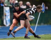 4 May 2024; Eve Conway of Skerries-Dundalk is tackled by Hannah Kennedy of Tullamore during the Leinster Rugby Bank of Ireland Girls Youth Finals Day match between Skerries-Dundalk and Tullamore at Energia Park in Dublin. Photo by Shauna Clinton/Sportsfile