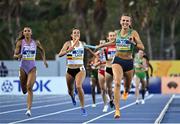 4 May 2024; Sharlene Mawdsley of Ireland, right, on her way to winning heat 3 of mixed 4x400m relay with a national record of 3:12.50 to qualify for the Paris 2024 Olympic Games during day one of the World Athletics Relays at Thomas A Robinson National Stadium in Nassau, Bahamas. Photo by Erik van Leeuwen/Sportsfile