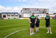 5 May 2024; Cockhill Celtic manager Gavin Cullen, left, inspects the pitch before the FAI Junior Cup final match between Cockhill Celtic and Gorey Rangers at Eamonn Deacy Park in Galway. Photo by Ben McShane/Sportsfile