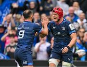 4 May 2024; Josh van der Flier of Leinster, right, celebrates with Jamison Gibson-Park after James Lowe, not pictured, scored their side's second try during the Investec Champions Cup semi-final match between Leinster and Northampton Saints at Croke Park in Dublin. Photo by Sam Barnes/Sportsfile