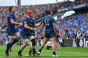 4 May 2024; James Lowe of Leinster, 11, celebrates with teammates Josh van der Flier and Joe McCarthy after scoring his side's first try during the Investec Champions Cup semi-final match between Leinster and Northampton Saints at Croke Park in Dublin. Photo by Harry Murphy/Sportsfile