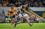5 May 2024; David Clifford of Kerry in action against Manus Doherty of Clare during the Munster GAA Football Senior Championship final match between Kerry and Clare at Cusack Park in Ennis, Clare. Photo by Brendan Moran/Sportsfile