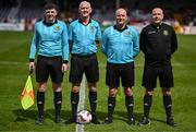 5 May 2024; Officials, from left, assistant referee Finn O'Sullivan, referee Tom McCarthy, assistant referee John Paul Grey and fourth official Alan McDonagh before the FAI Junior Cup final match between Cockhill Celtic and Gorey Rangers at Eamonn Deacy Park in Galway. Photo by Ben McShane/Sportsfile