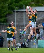 5 May 2024; Joe O'Connor of Kerry catches a kickout ahead of Brian McNamara of Clare during the Munster GAA Football Senior Championship final match between Kerry and Clare at Cusack Park in Ennis, Clare. Photo by Brendan Moran/Sportsfile