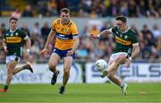 5 May 2024; Paudie Clifford of Kerry in action against Cillian Brennan of Clare during the Munster GAA Football Senior Championship final match between Kerry and Clare at Cusack Park in Ennis, Clare. Photo by Brendan Moran/Sportsfile