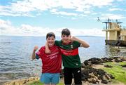 5 May 2024; Mayo supporters Jack O'Haire Joyce, left, aged 11, and Rían Holian, aged 10, from Newport, Mayo, at the Blackrock diving board ahead of the Connacht GAA Football Senior Championship final match between Galway and Mayo at Pearse Stadium in Galway. Photo by Daire Brennan/Sportsfile