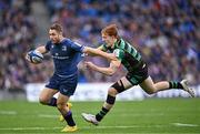 4 May 2024; Jordan Larmour of Leinster is tackled by George Hendy of Northampton Saints during the Investec Champions Cup semi-final match between Leinster and Northampton Saints at Croke Park in Dublin. Photo by Harry Murphy/Sportsfile