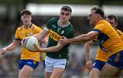 5 May 2024; Sean O'Shea of Kerry in action against Alan Sweeney of Clare during the Munster GAA Football Senior Championship final match between Kerry and Clare at Cusack Park in Ennis, Clare. Photo by Brendan Moran/Sportsfile