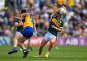 5 May 2024; Tony Brosnan of Kerry ducks inside Cillian Brennan of Clare during the Munster GAA Football Senior Championship final match between Kerry and Clare at Cusack Park in Ennis, Clare. Photo by Brendan Moran/Sportsfile