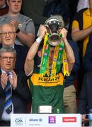 5 May 2024; Paudie Clifford of Kerry lifts the cup after his side's victory in the Munster GAA Football Senior Championship final match between Kerry and Clare at Cusack Park in Ennis, Clare. Photo by John Sheridan/Sportsfile