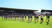 5 May 2024; Mayo and Galway players parade before the Connacht GAA Football Senior Championship final match between Galway and Mayo at Pearse Stadium in Galway. Photo by Seb Daly/Sportsfile