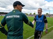 5 May 2024; Clare manager Mark Fitzgerald, right, and Kerry manager Jack O'Connor shake hands after the Munster GAA Football Senior Championship final match between Kerry and Clare at Cusack Park in Ennis, Clare. Photo by Brendan Moran/Sportsfile