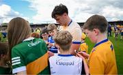 5 May 2024; David Clifford of Kerry signs autographs after the Munster GAA Football Senior Championship final match between Kerry and Clare at Cusack Park in Ennis, Clare. Photo by Brendan Moran/Sportsfile