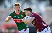 5 May 2024; Damien Comer of Galway in action against David McBrien of Mayo during the Connacht GAA Football Senior Championship final match between Galway and Mayo at Pearse Stadium in Galway. Photo by Seb Daly/Sportsfile