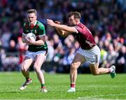 5 May 2024; Matthew Ruane of Mayo in action against Paul Conroy of Galway during the Connacht GAA Football Senior Championship final match between Galway and Mayo at Pearse Stadium in Galway. Photo by Piaras Ó Mídheach/Sportsfile