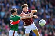 5 May 2024; Robert Finnerty of Galway in action against Jack Coyne of Mayo during the Connacht GAA Football Senior Championship final match between Galway and Mayo at Pearse Stadium in Galway. Photo by Seb Daly/Sportsfile
