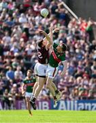 5 May 2024; Cein Darcy of Galway in action against Matthew Ruane of Mayo during the Connacht GAA Football Senior Championship final match between Galway and Mayo at Pearse Stadium in Galway. Photo by Daire Brennan/Sportsfile