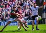 5 May 2024; Jordan Flynn of Mayo in action against John Daly of Galway during the Connacht GAA Football Senior Championship final match between Galway and Mayo at Pearse Stadium in Galway. Photo by Piaras Ó Mídheach/Sportsfile