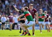 5 May 2024; Damien Comer of Galway celebrates after winning a free of Mayo's David McBrien, 6, during the Connacht GAA Football Senior Championship final match between Galway and Mayo at Pearse Stadium in Galway. Photo by Seb Daly/Sportsfile