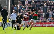 5 May 2024; Cathal Sweeney of Galway in action against Sam Callinan of Mayo during the Connacht GAA Football Senior Championship final match between Galway and Mayo at Pearse Stadium in Galway. Photo by Daire Brennan/Sportsfile
