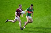 5 May 2024; Jack Glynn of Galway in action against Tommy Conroy of Mayo during the Connacht GAA Football Senior Championship final match between Galway and Mayo at Pearse Stadium in Galway. Photo by Daire Brennan/Sportsfile