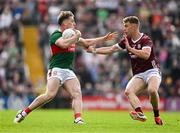 5 May 2024; Eoghan McLaughlin of Mayo in action against Dylan McHugh of Galway during the Connacht GAA Football Senior Championship final match between Galway and Mayo at Pearse Stadium in Galway. Photo by Daire Brennan/Sportsfile
