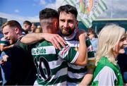 5 May 2024; Cockhill Celtic captain James Bradley, right, celebrates with teammate Corey McBride after the FAI Junior Cup final match between Cockhill Celtic and Gorey Rangers at Eamonn Deacy Park in Galway. Photo by Ben McShane/Sportsfile