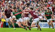5 May 2024; Jordan Flynn of Mayo in action against John Daly of Galway during the Connacht GAA Football Senior Championship final match between Galway and Mayo at Pearse Stadium in Galway. Photo by Daire Brennan/Sportsfile