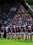 5 May 2024; Spectators watch the parade before the Connacht GAA Football Senior Championship final match between Galway and Mayo at Pearse Stadium in Galway. Photo by Piaras Ó Mídheach/Sportsfile