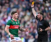 5 May 2024; Jordan Flynn of Mayo reacts as he is shown a yellow card by referee David Gough during the Connacht GAA Football Senior Championship final match between Galway and Mayo at Pearse Stadium in Galway. Photo by Piaras Ó Mídheach/Sportsfile