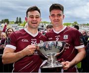 5 May 2024; Galway players Cillian McDaid, left, and Seán Kelly with the trophy after their side's victory in the Connacht GAA Football Senior Championship final match between Galway and Mayo at Pearse Stadium in Galway. Photo by Seb Daly/Sportsfile
