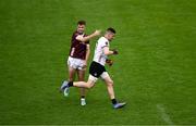 5 May 2024; Galway goalkeeper Connor Gleeson is congratulated by team-mate Paul Conroy after scoring the winning point near the end of the Connacht GAA Football Senior Championship final match between Galway and Mayo at Pearse Stadium in Galway. Photo by Daire Brennan/Sportsfile