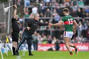 5 May 2024; Mayo manager Kevin McStay shakes hands with Aidan O'Shea after O'Shea was substituted off during the Connacht GAA Football Senior Championship final match between Galway and Mayo at Pearse Stadium in Galway. Photo by Daire Brennan/Sportsfile
