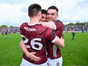 5 May 2024; Galway players, from left, Sam O'Neill, Seán Kelly and Daniel Ó Flaherty celebrate after their side's victory in the Connacht GAA Football Senior Championship final match between Galway and Mayo at Pearse Stadium in Galway. Photo by Piaras Ó Mídheach/Sportsfile