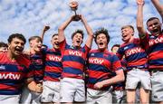 5 May 2024; Clontarf players, including captain Michael Barnes, centre, celebrate after their side's victory in the Leinster Rugby Bank of Ireland Schools Youth Finals Day match between Clontarf and Newbridge at Energia Park in Dublin. Photo by Shauna Clinton/Sportsfile