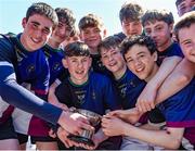5 May 2024; DOW/ Kesterals players, including captain Ross Mahon, centre, celebrate after their side's victory in the Leinster Rugby Bank of Ireland Schools Youth Finals Day match between West Offaly/ Portarlington and DOW/ Kesterals at Energia Park in Dublin. Photo by Shauna Clinton/Sportsfile