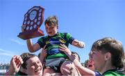 5 May 2024; Seapoint players celebrate after their side's victory in the Leinster Rugby Bank of Ireland Schools Youth Finals Day match between Seapoint and MU Barnhall at Energia Park in Dublin. Photo by Shauna Clinton/Sportsfile