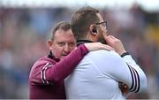 5 May 2024; Galway selector John Concannon, left, can't watch the final free, along with trainer Cian O'Neill, near the end of the the Connacht GAA Football Senior Championship final match between Galway and Mayo at Pearse Stadium in Galway. Photo by Seb Daly/Sportsfile