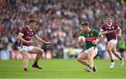 5 May 2024; Jordan Flynn of Mayo in action against John Daly of Galway during the Connacht GAA Football Senior Championship final match between Galway and Mayo at Pearse Stadium in Galway. Photo by Seb Daly/Sportsfile
