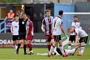 6 May 2024; Gary Deegan of Drogheda United recieves a yellow card from referee Robert Harvey during the SSE Airtricity Men's Premier Division match between Drogheda United and Dundalk at Weavers Park in Drogheda, Louth. Photo by Ben McShane/Sportsfile