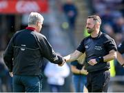 5 May 2024; Referee David Gough shakes hands with Mayo manager Kevin McStay before the Connacht GAA Football Senior Championship final match between Galway and Mayo at Pearse Stadium in Galway. Photo by Seb Daly/Sportsfile
