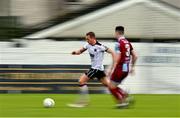 6 May 2024; John Mountney of Dundalk in action against Evan Weir of Drogheda United during the SSE Airtricity Men's Premier Division match between Drogheda United and Dundalk at Weavers Park in Drogheda, Louth. Photo by Ben McShane/Sportsfile