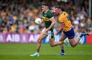 5 May 2024; Sean O'Shea of Kerry in action against Darragh Bohannon of Clare during the Munster GAA Football Senior Championship final match between Kerry and Clare at Cusack Park in Ennis, Clare. Photo by Brendan Moran/Sportsfile