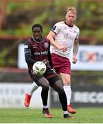 6 May 2024; Aboubacar Keita of Bohemians in action against Stephen Walsh of Galway United during the SSE Airtricity Men's Premier Division match between Bohemians and Galway United at Dalymount Park in Dublin. Photo by Ben McShane/Sportsfile