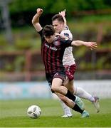 6 May 2024; James Clarke of Bohemians is tackled by Maurice Nugent of Galway United during the SSE Airtricity Men's Premier Division match between Bohemians and Galway United at Dalymount Park in Dublin. Photo by Ben McShane/Sportsfile